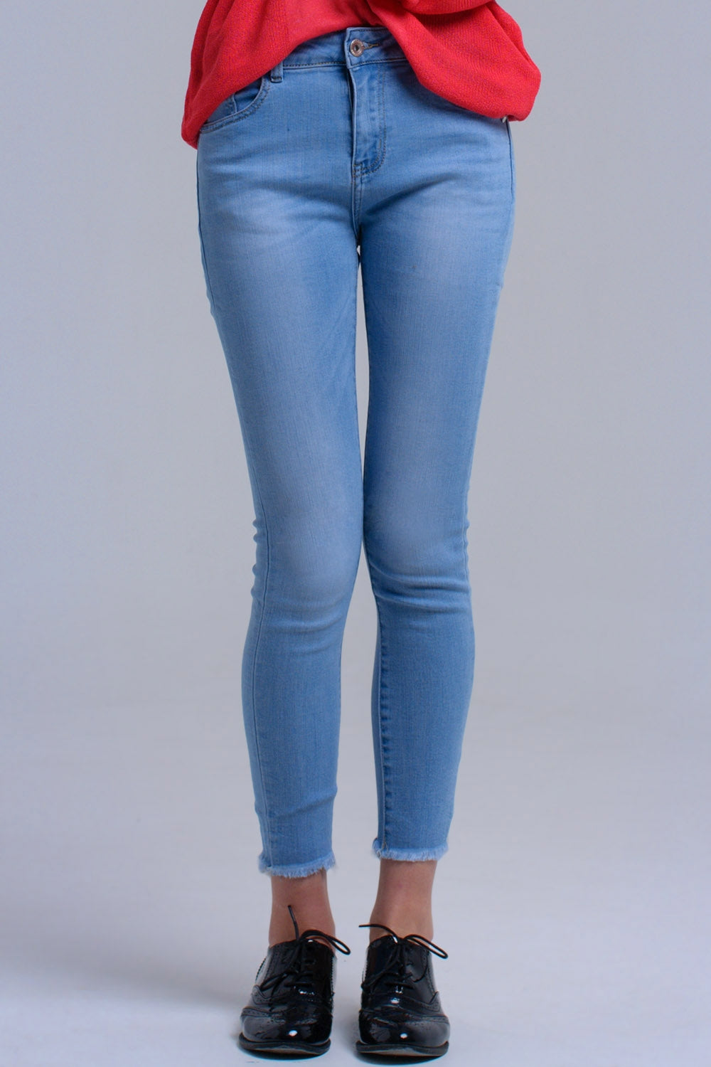 Jeans skinny azzurri con frange
