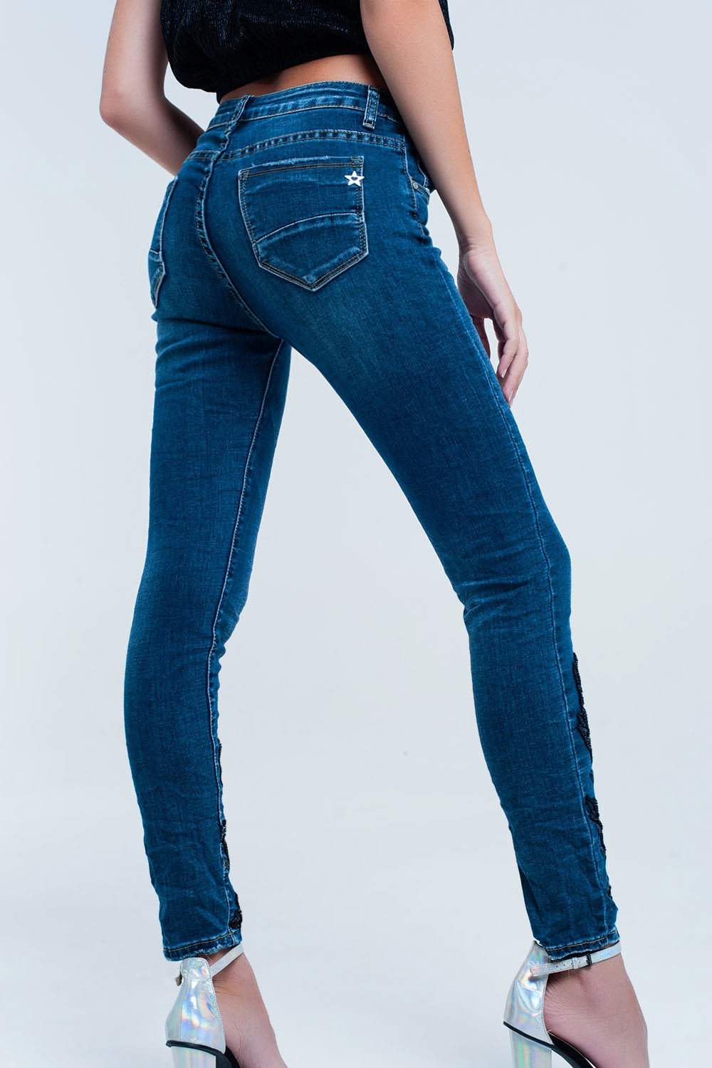Jeans skinny blu con strass