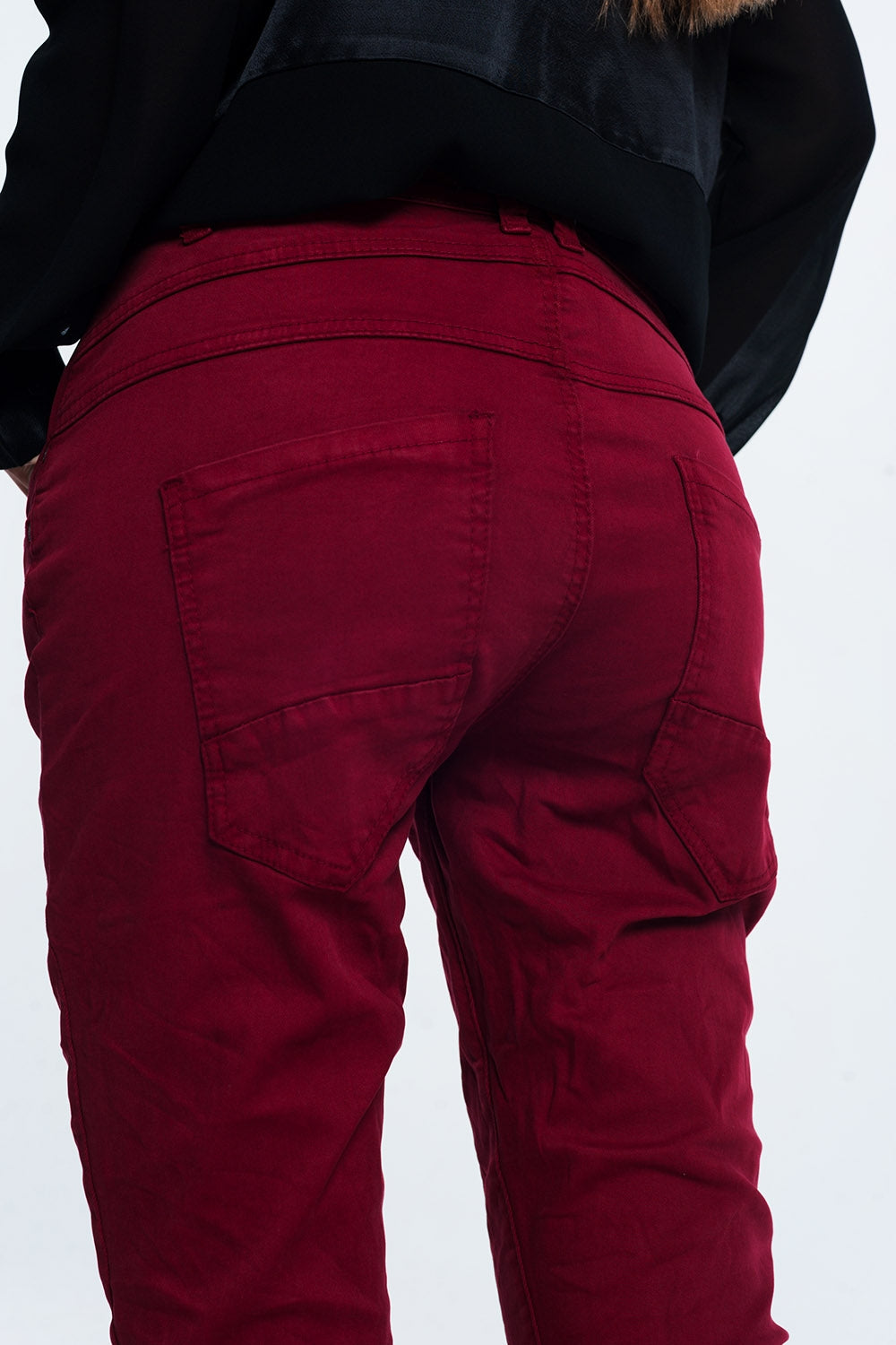 Jeans skinny bordeaux con cavallo basso