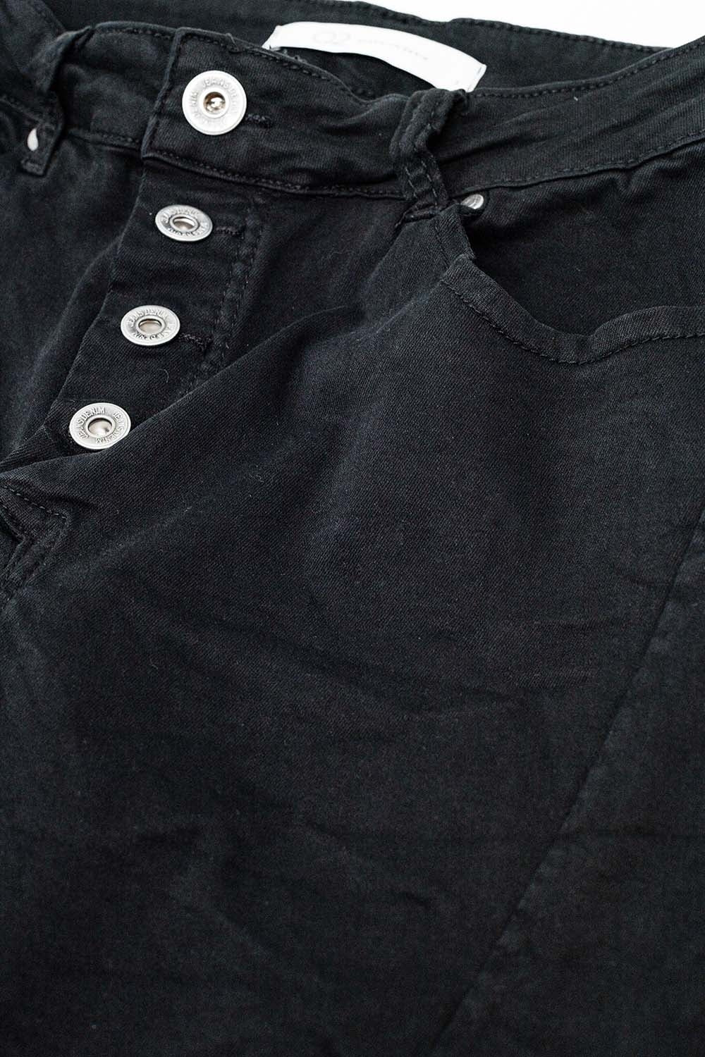 Jeans skinny con bottoni a vista in nero