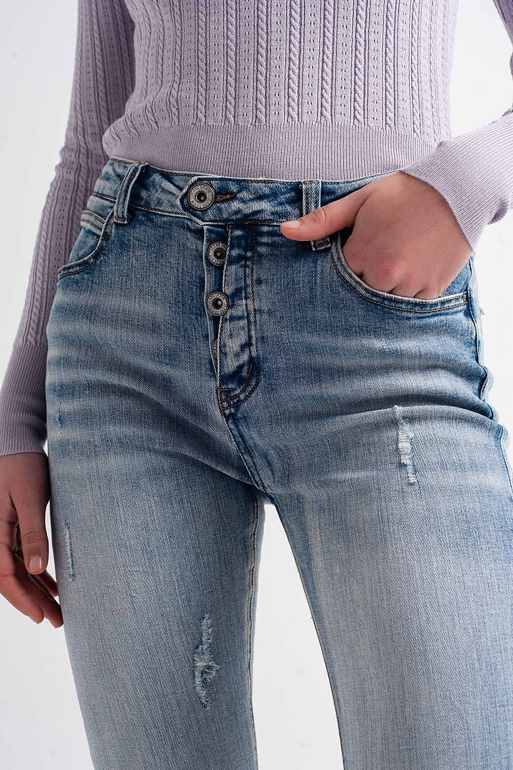 Jeans skinny con bottoni a vista sul davanti colore blu medio