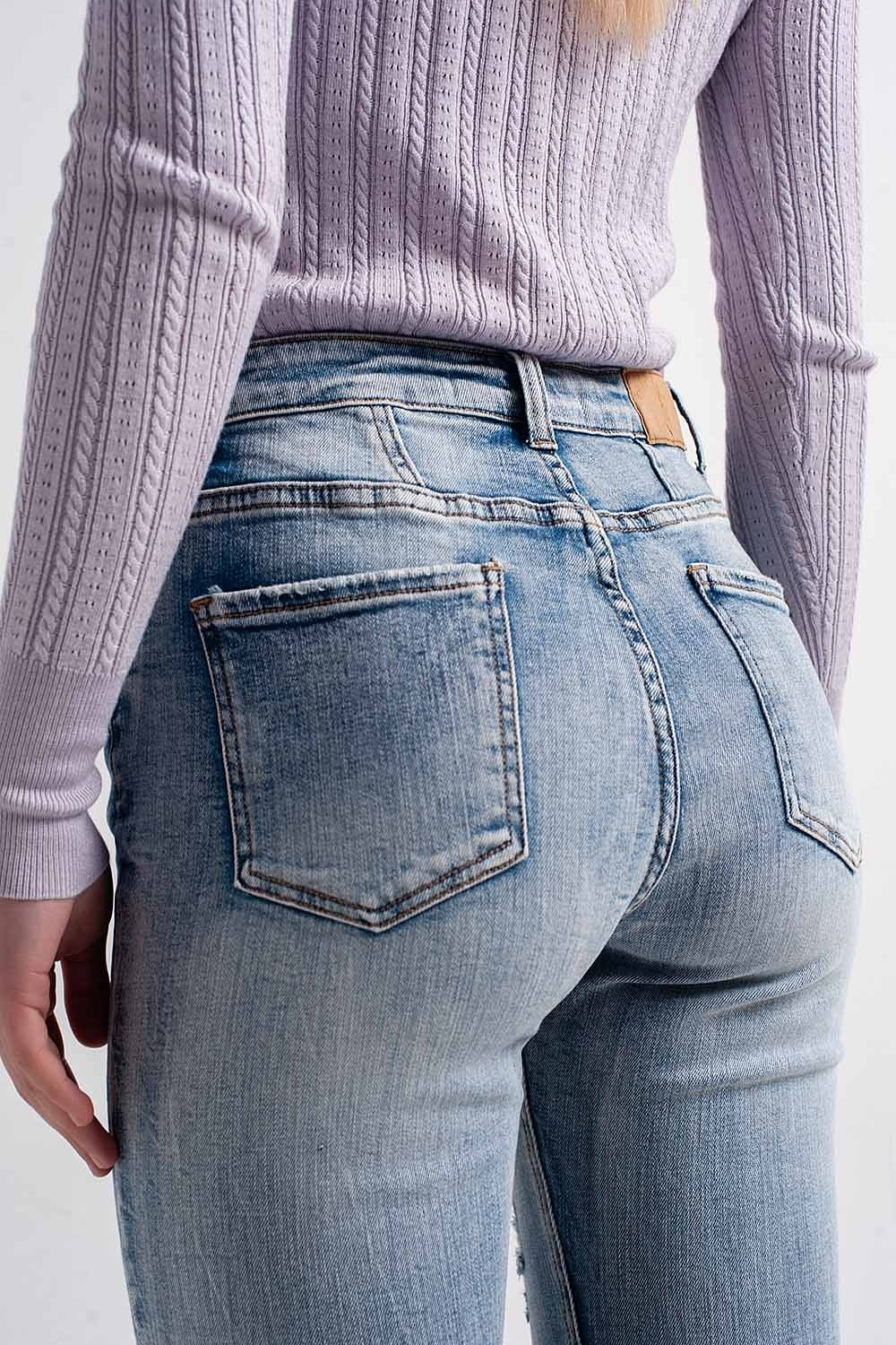 Jeans skinny con bottoni a vista sul davanti colore blu medio