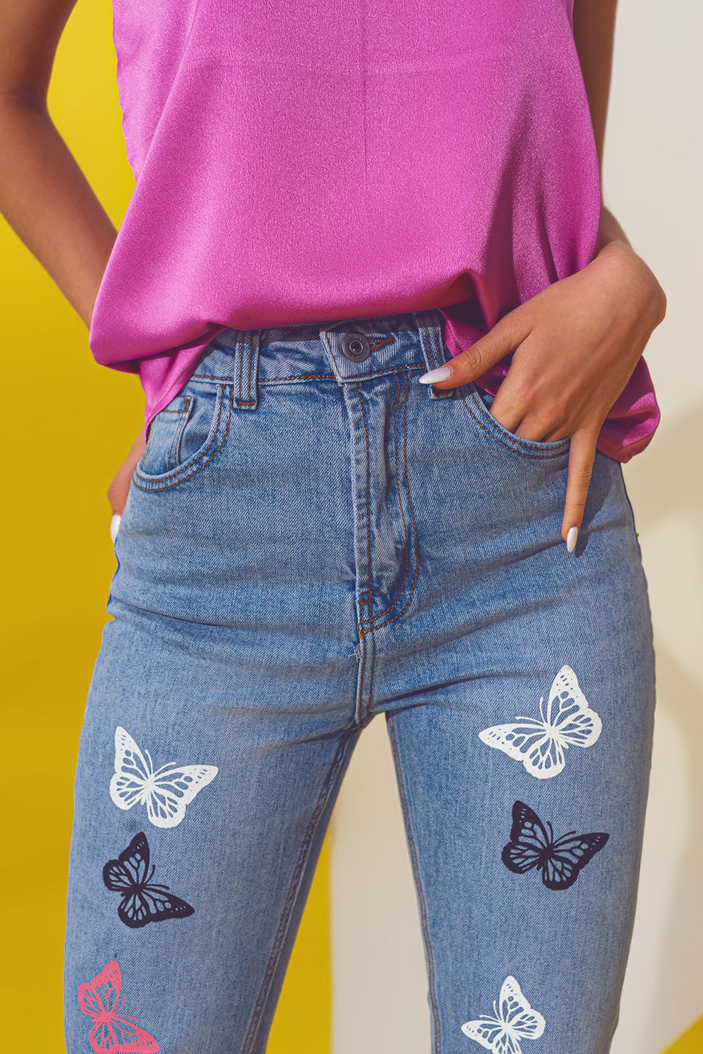 Jeans skinny con dettaglio farfalla in lavaggio blu chiaro