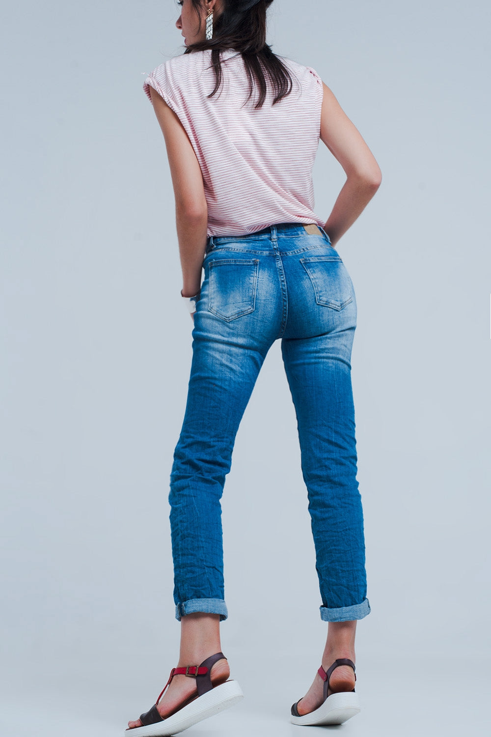 Jeans skinny con effetto rugoso