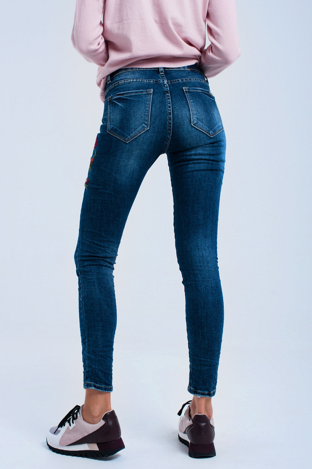 Jeans skinny con fiori