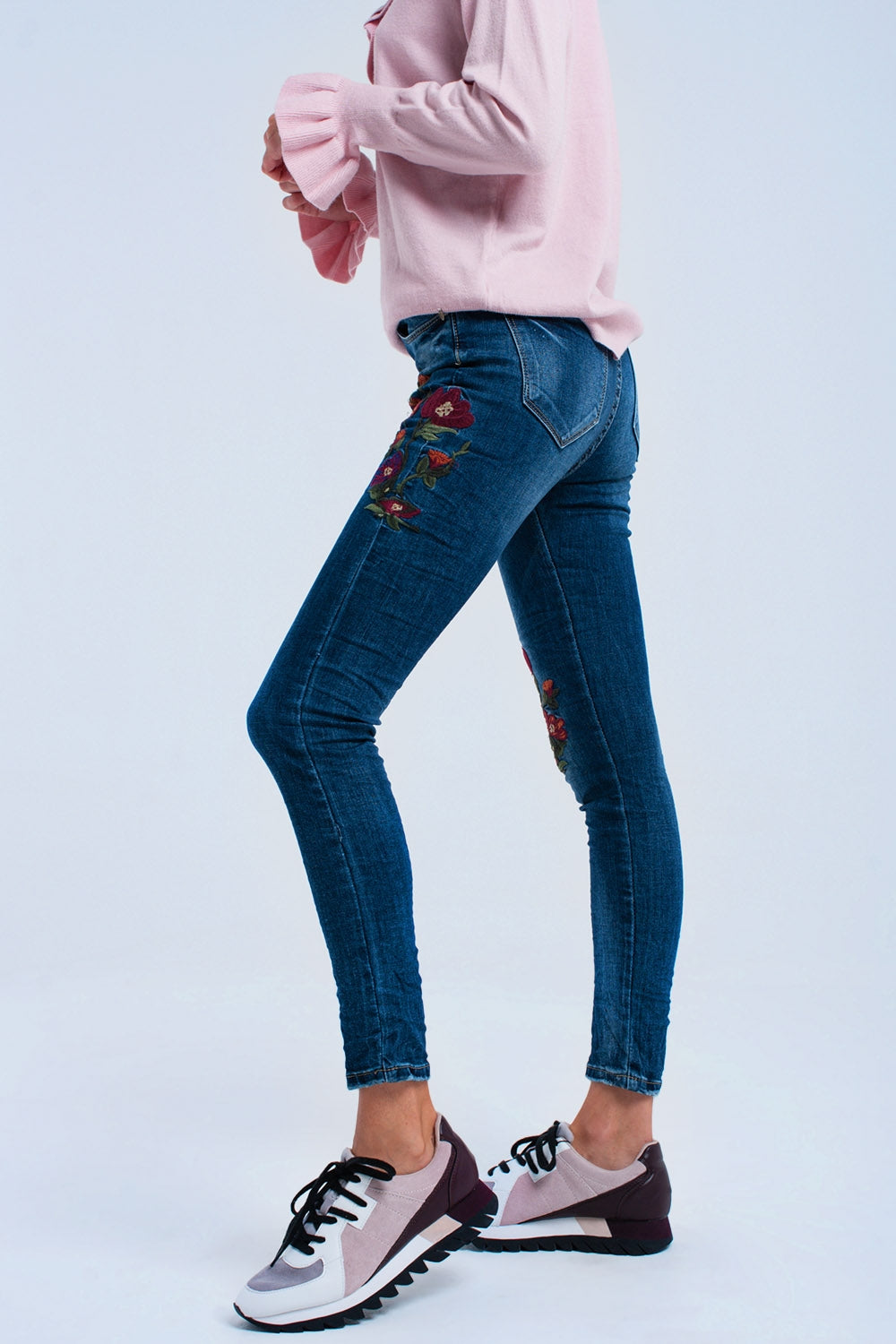 Jeans skinny con fiori