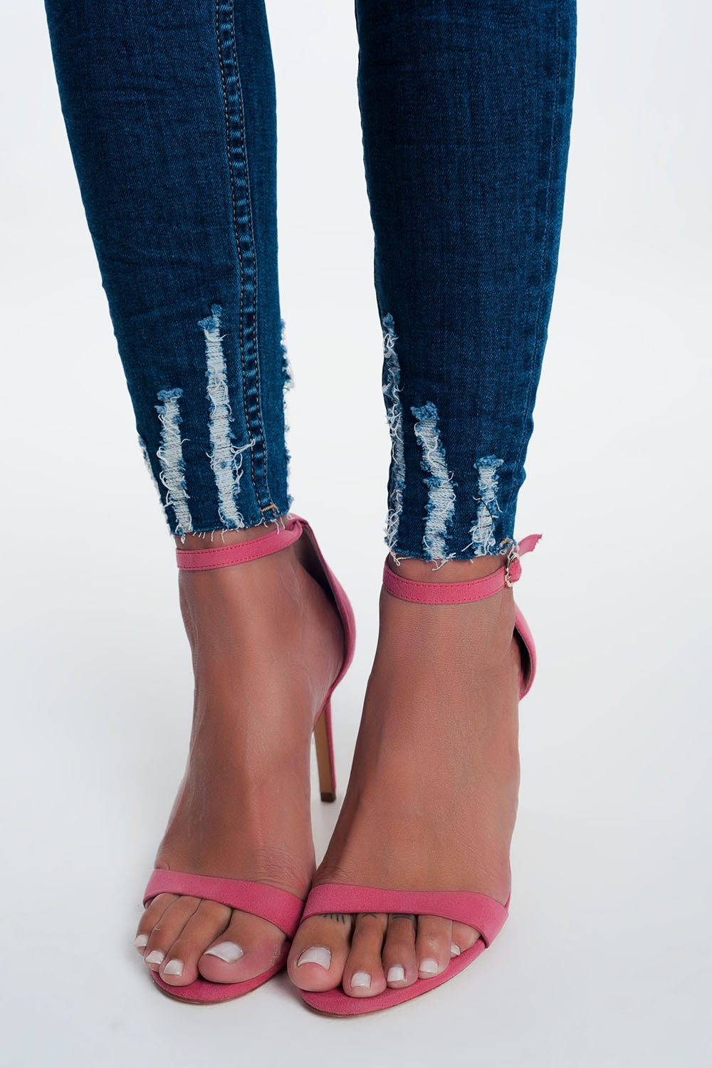 Jeans skinny con orlo grezzo