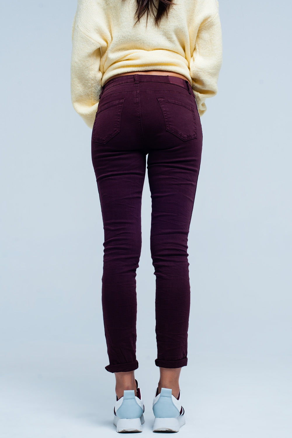 Jeans skinny con riga laterale metallizzata