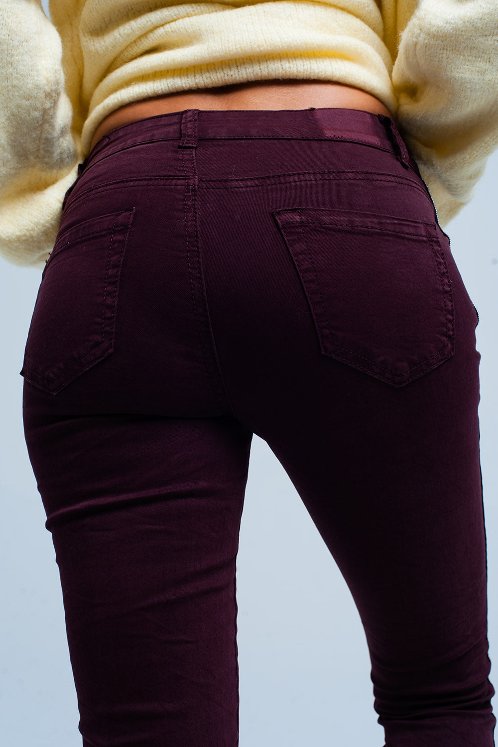Jeans skinny con riga laterale metallizzata