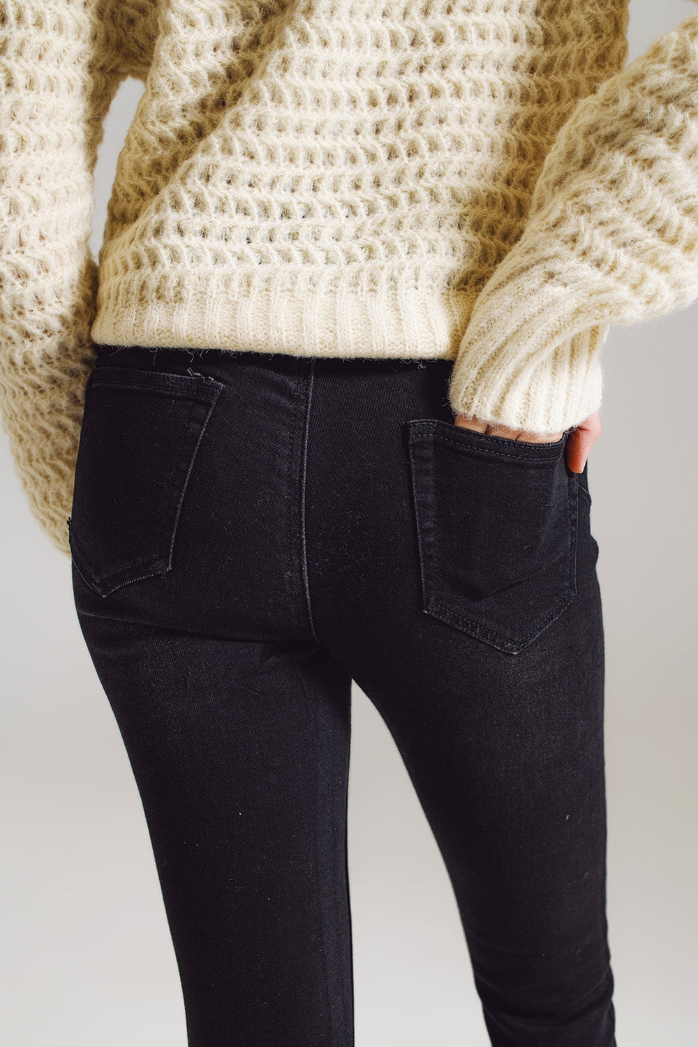 Jeans skinny con strass ricamati su tutto in nero