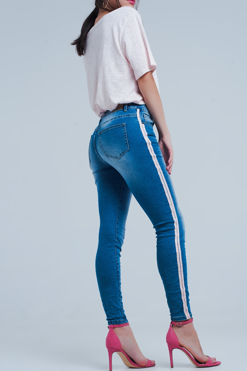 Jeans skinny con strisce laterali in rosa