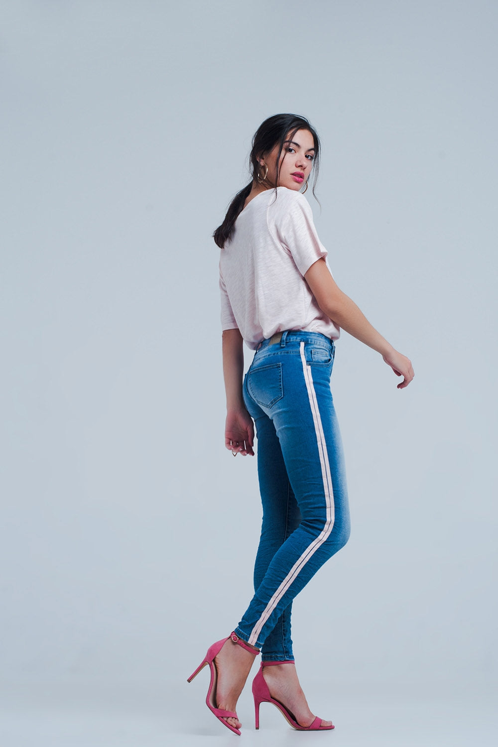 Jeans skinny con strisce laterali in rosa