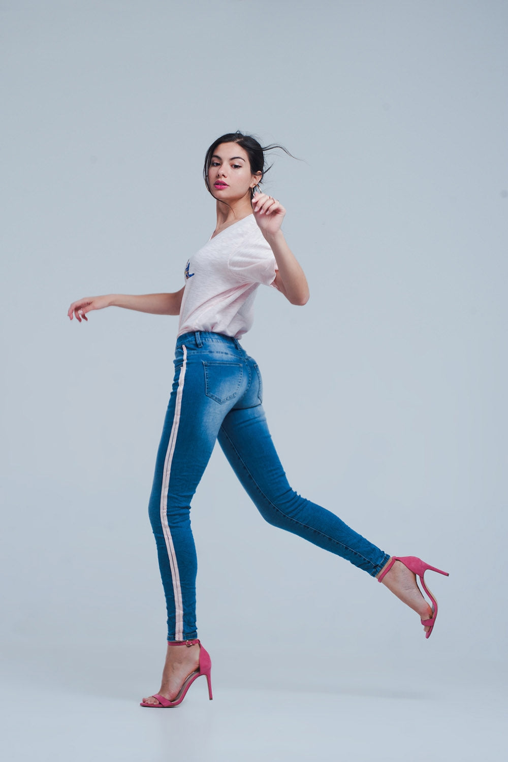Jeans skinny con strisce laterali in rosa