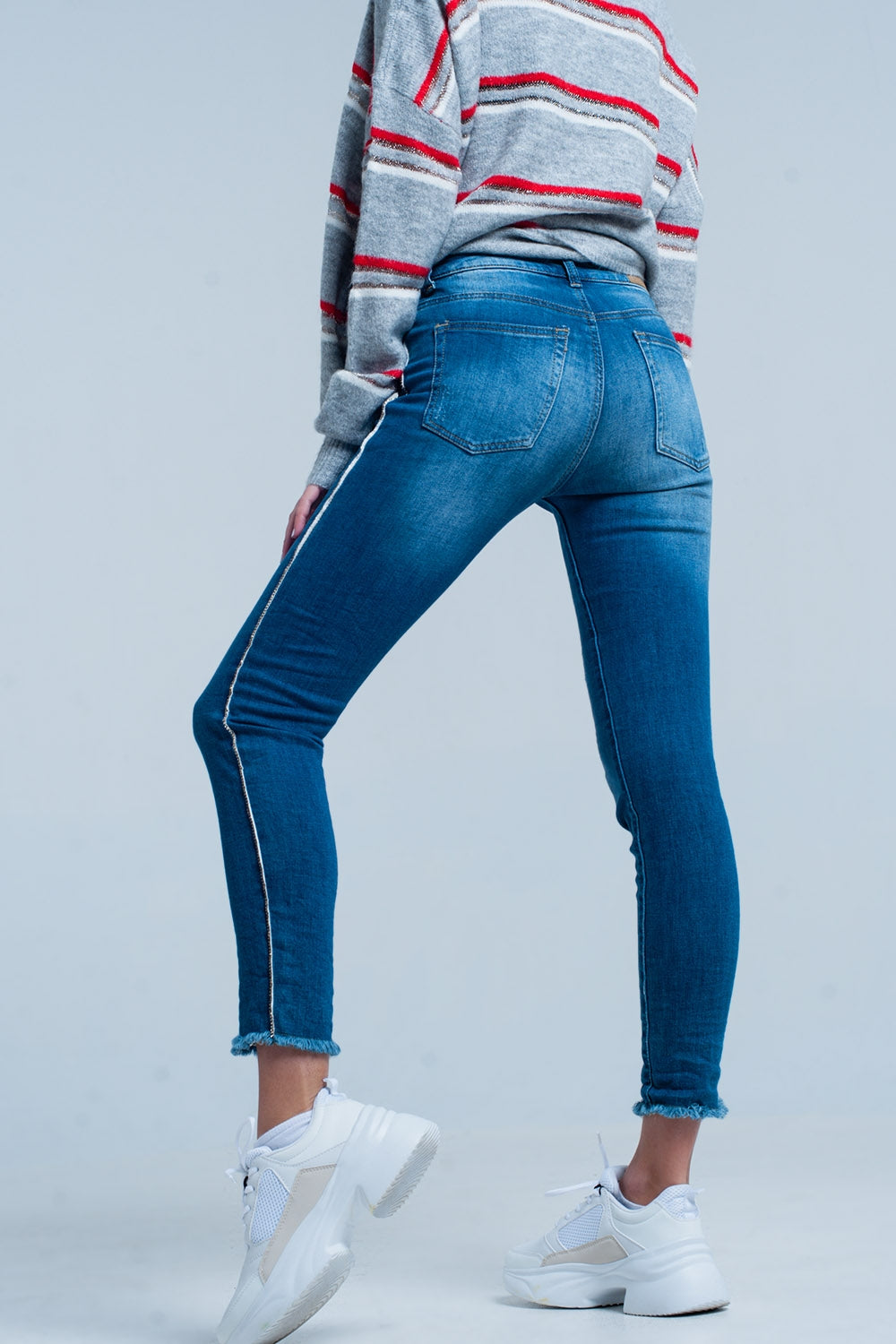 Jeans skinny con striscia laterale con strass