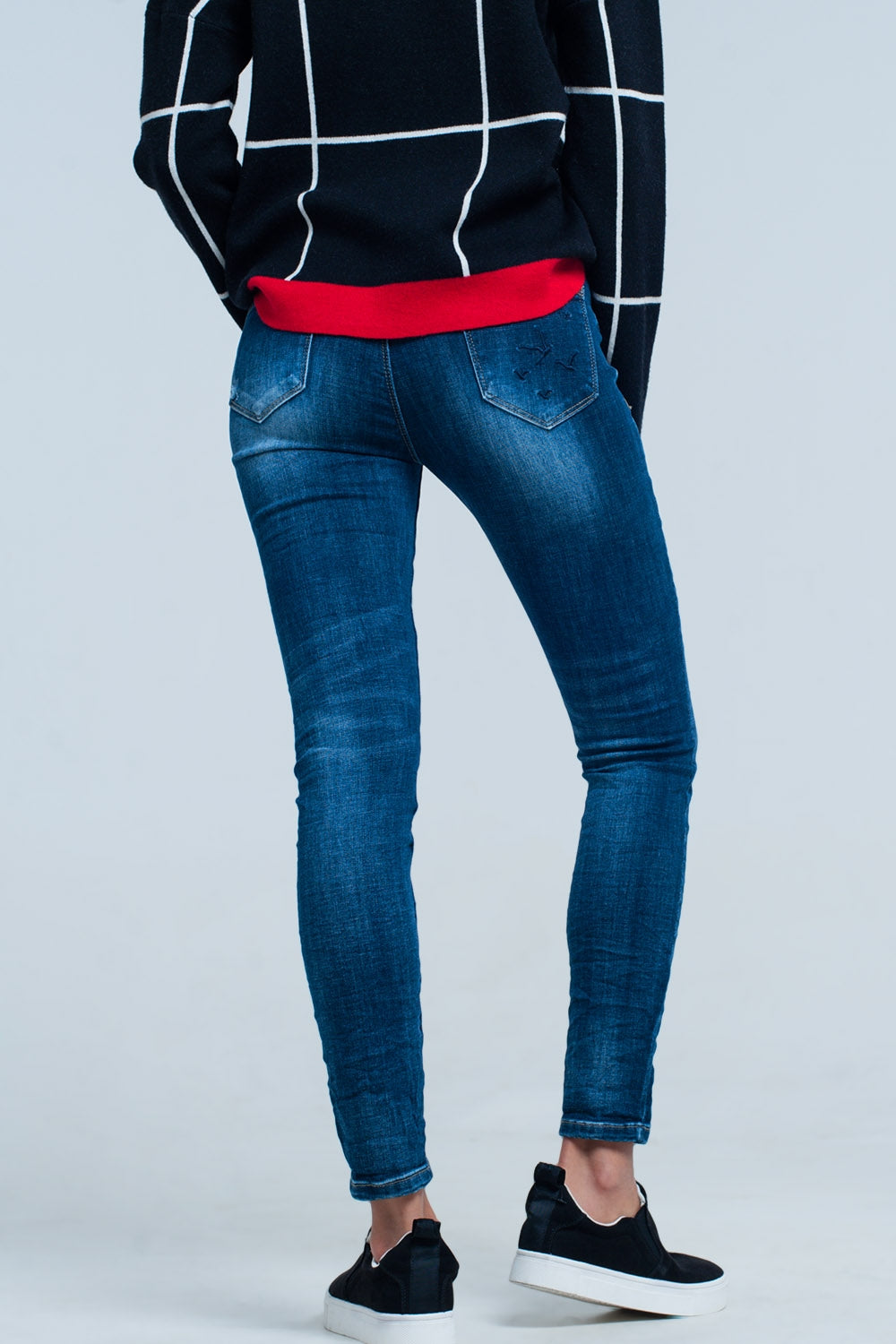 Jeans skinny con tasca ricamata