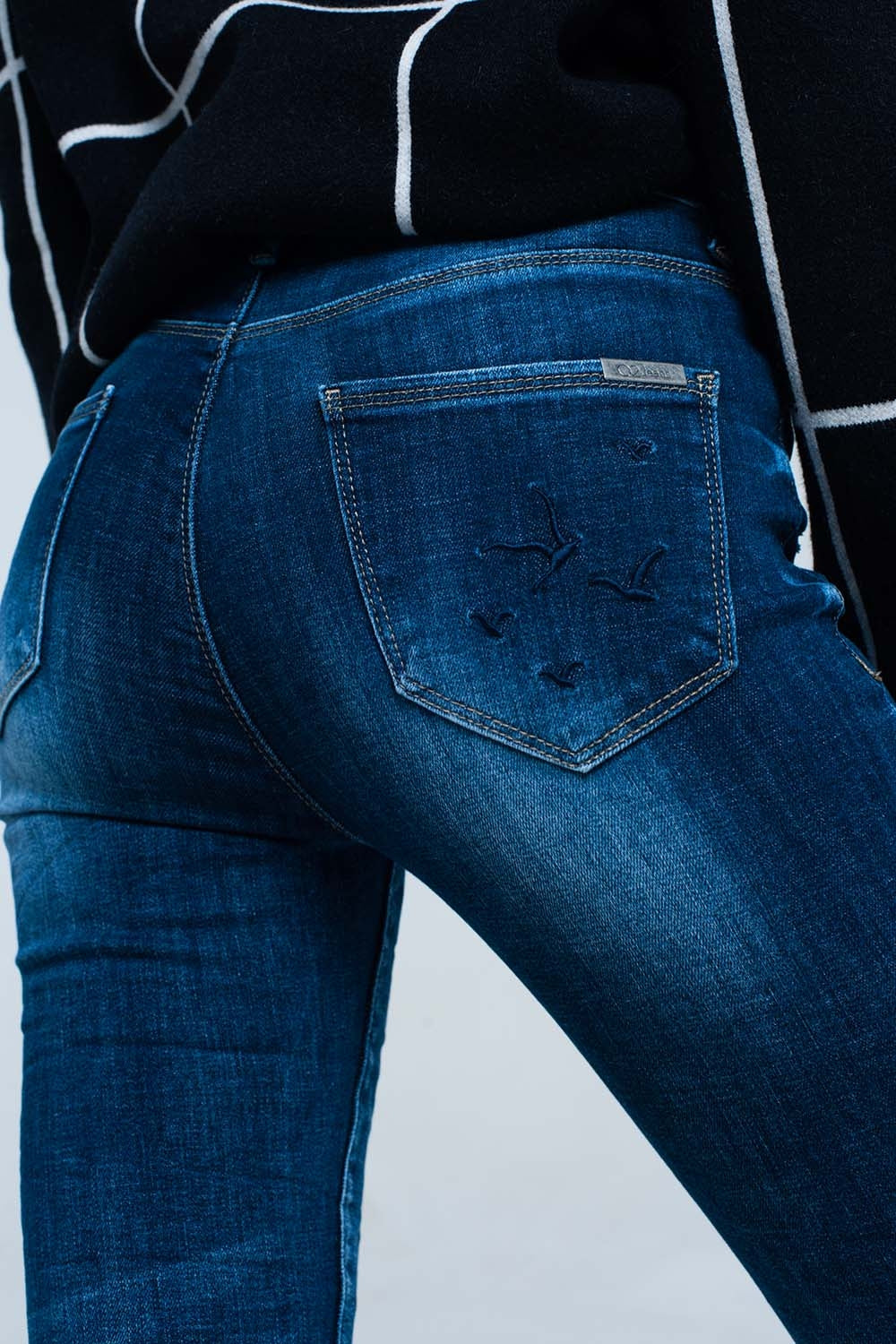 Jeans skinny con tasca ricamata