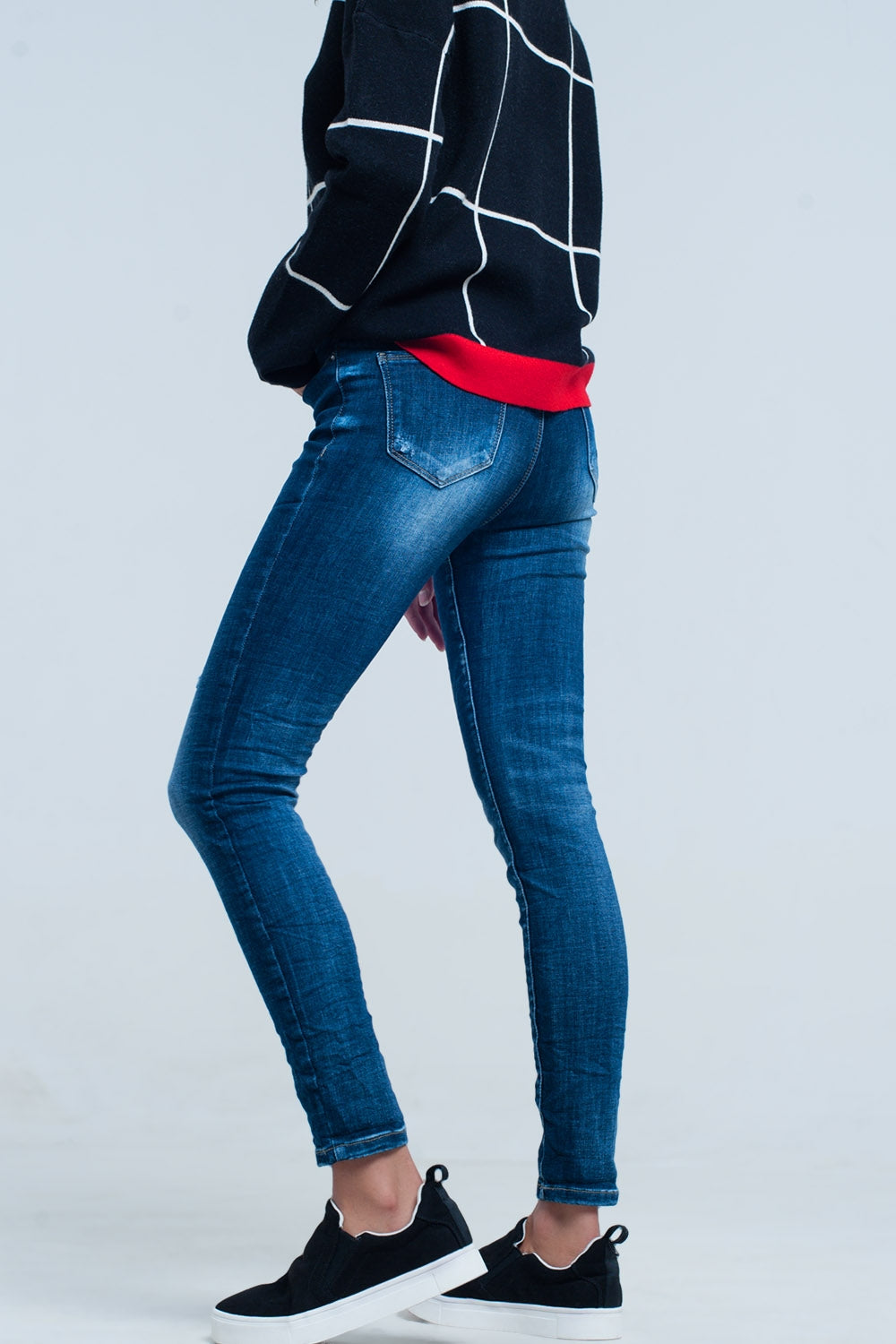 Jeans skinny con tasca ricamata