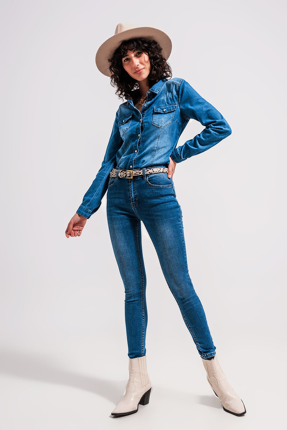 Jeans skinny elasticizzati a vita alta con lavaggio blu medio