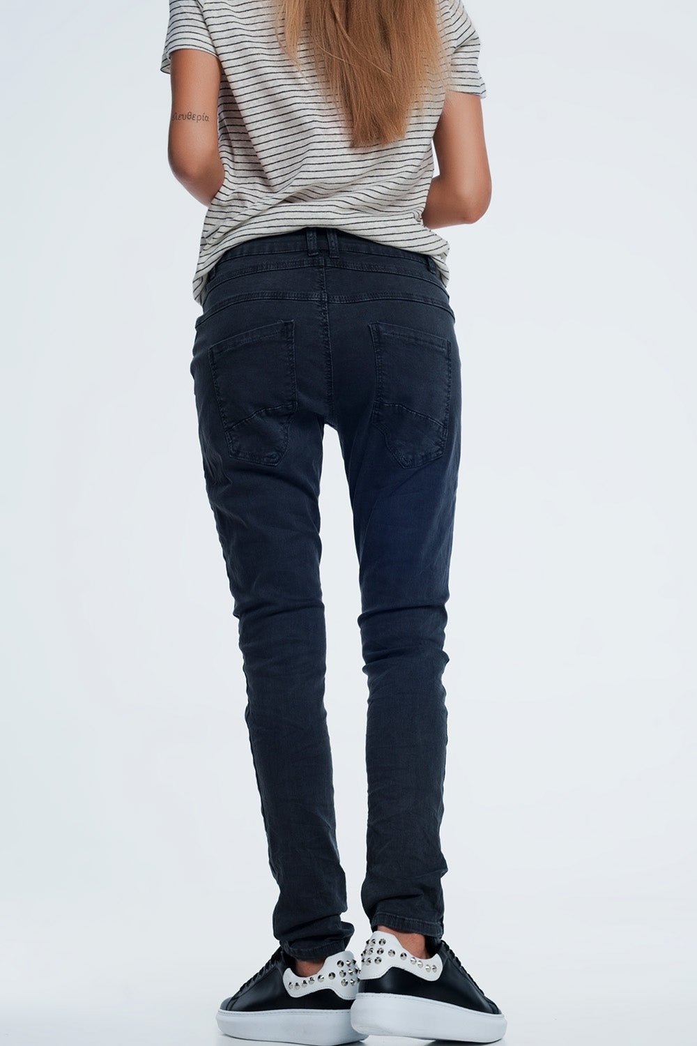 jeans skinny grigio con cavallo basso