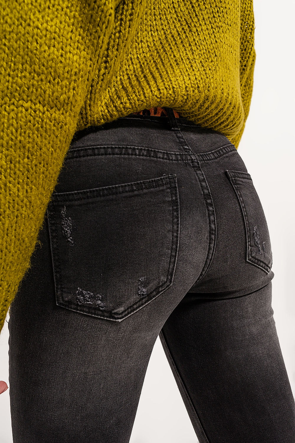 Jeans skinny in denim grigio con rotture