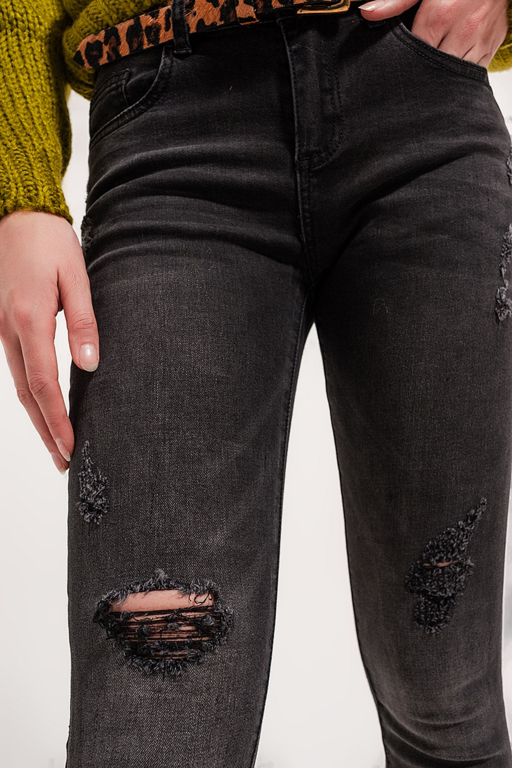 Jeans skinny in denim grigio con rotture