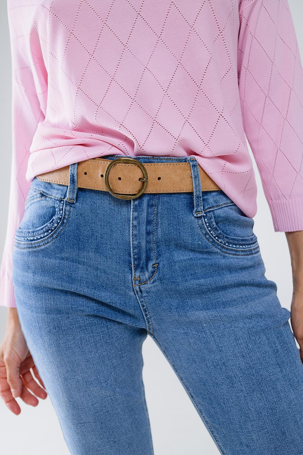 Jeans skinny in lavaggio chiaro con dettaglio sulla tasca