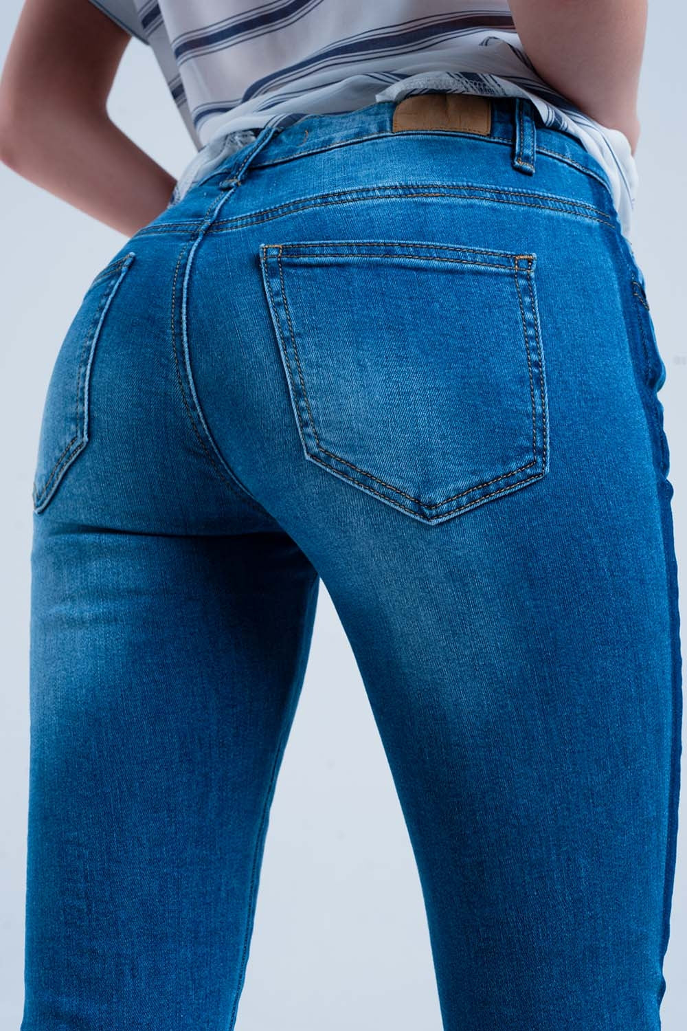 Jeans skinny lavaggio blu con riga laterale blu