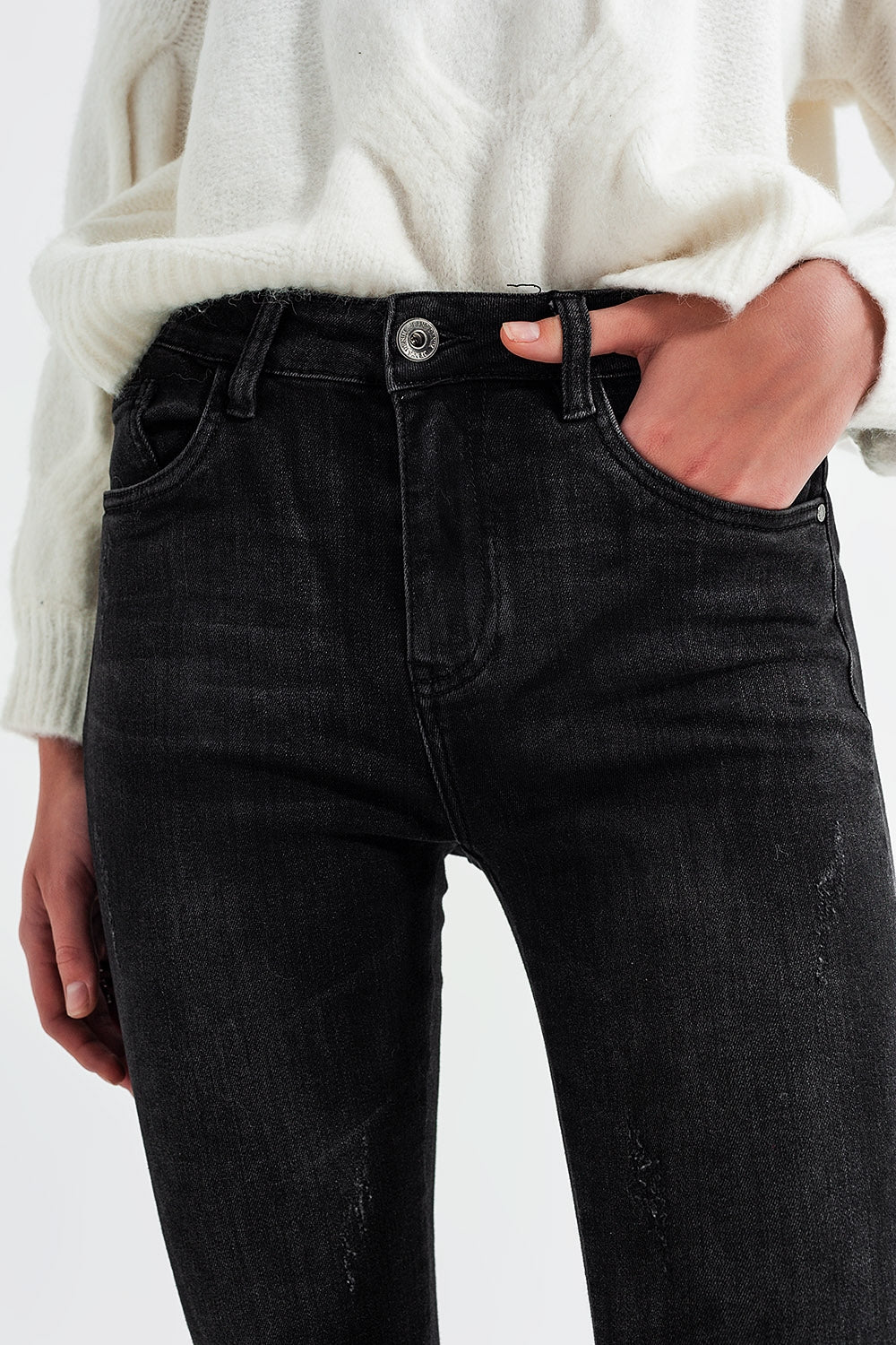 Jeans skinny lavaggio nero con zip sulla caviglia