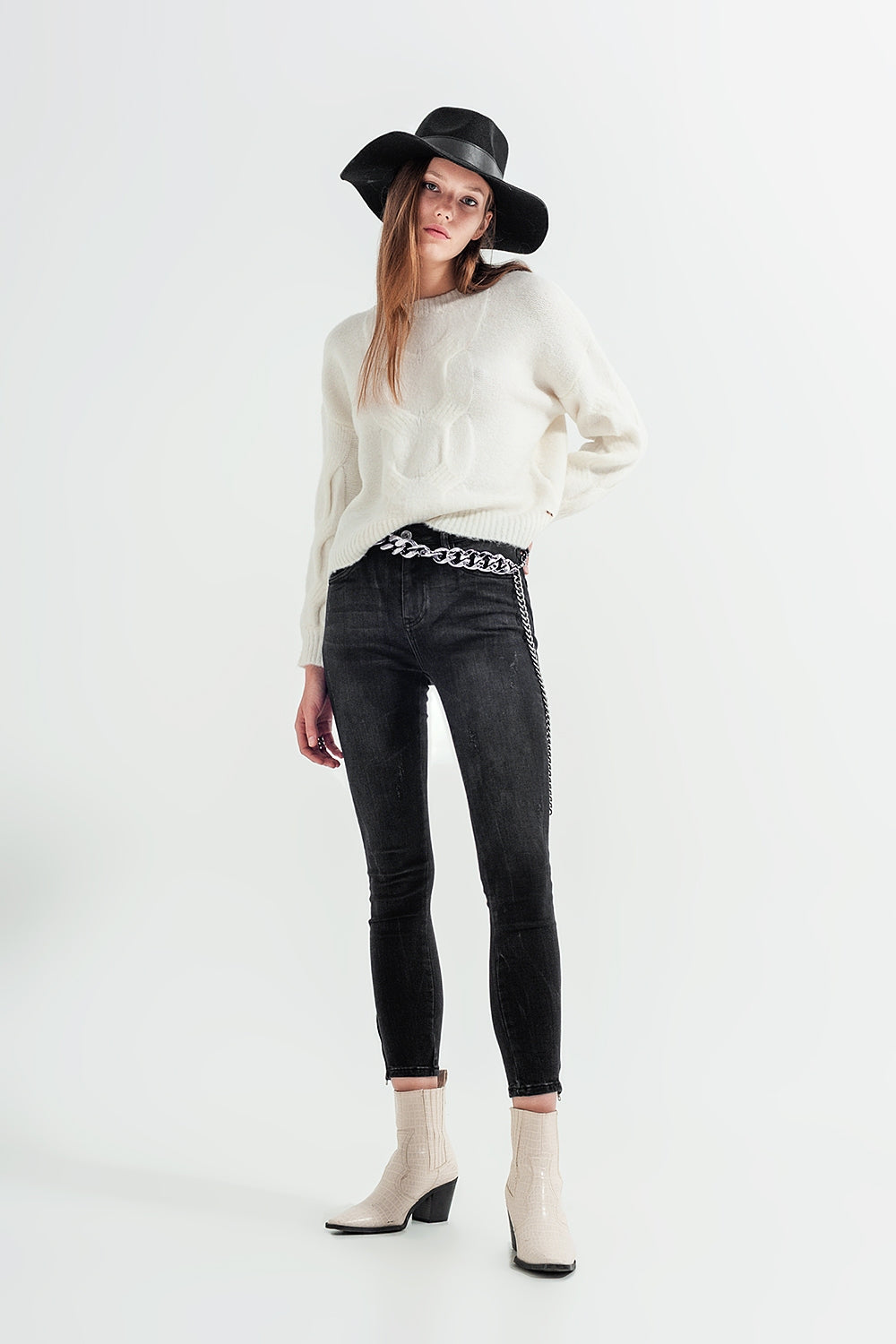 Jeans skinny lavaggio nero con zip sulla caviglia