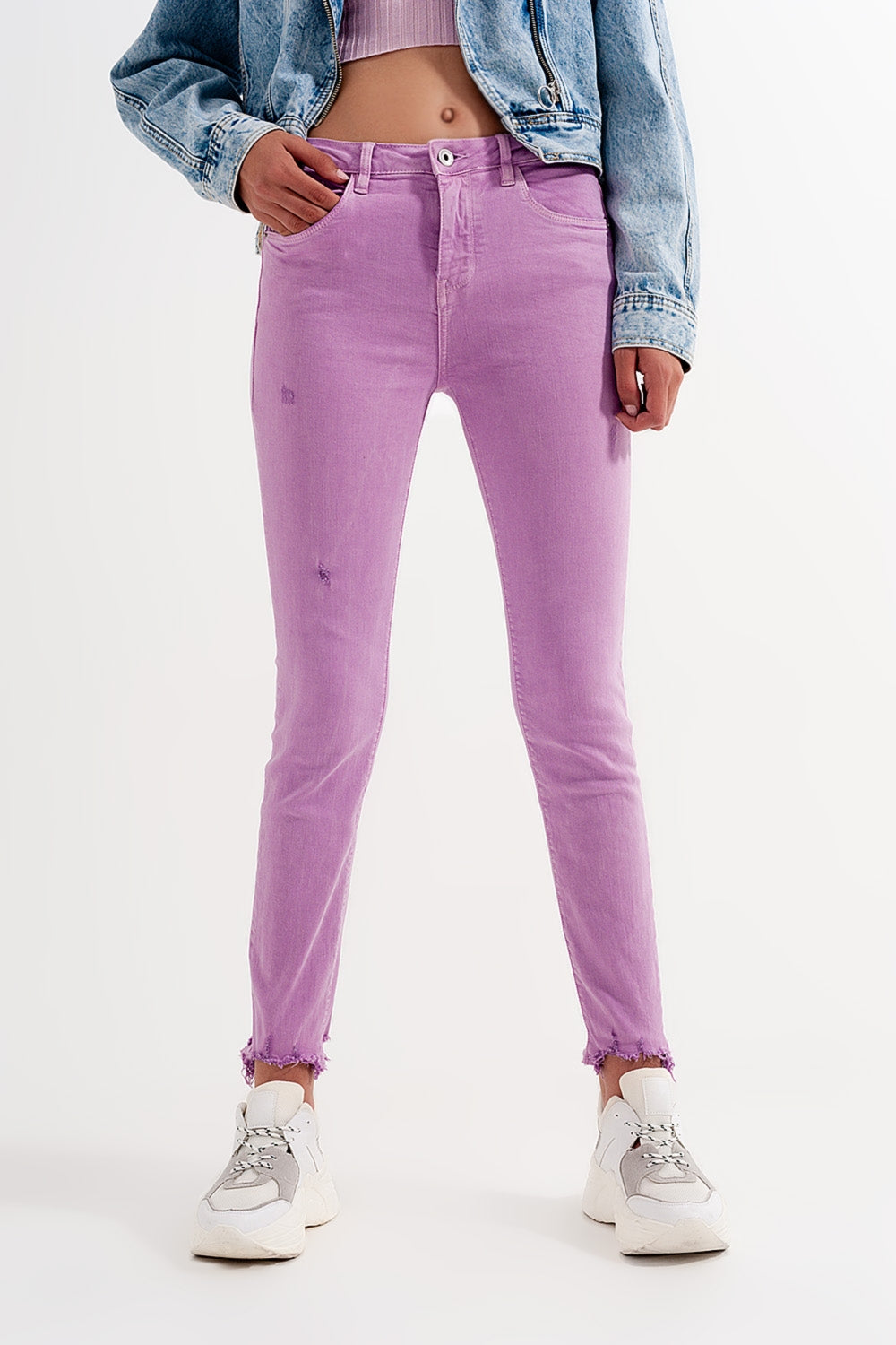Jeans skinny lilla con fondo effetto invecchiato
