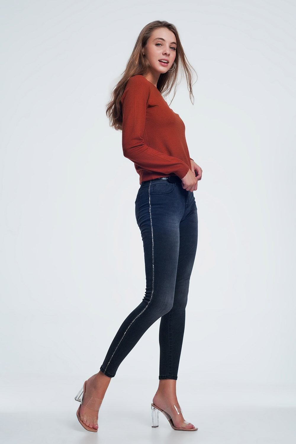 Jeans skinny neri con decorazione laterale