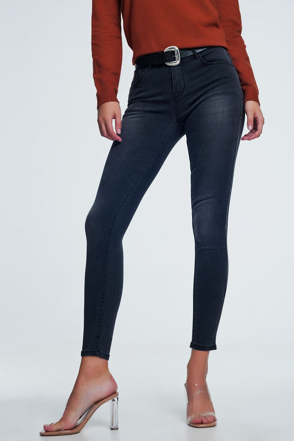 Jeans skinny neri con decorazione laterale