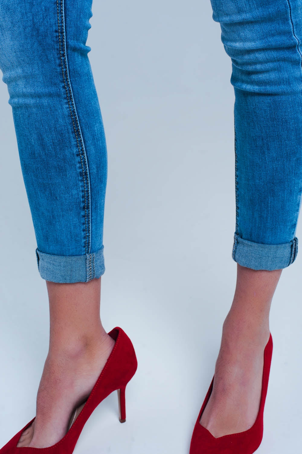 Jeans skinny slavati con stampa leopardo