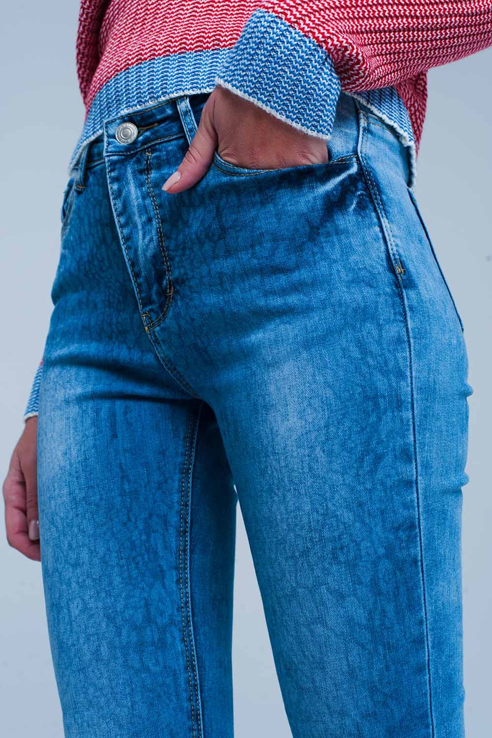 Jeans skinny slavati con stampa leopardo