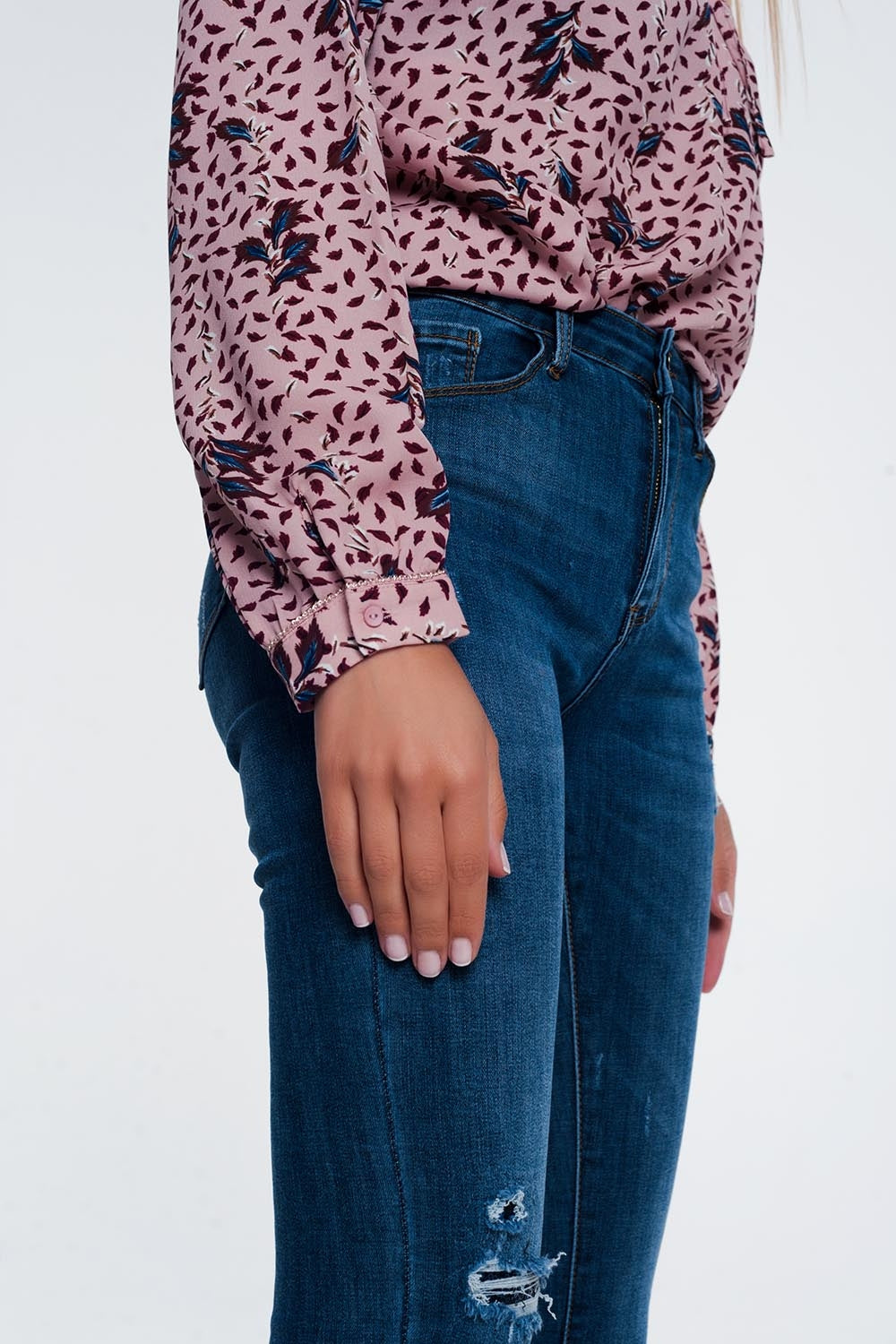 Jeans skinny strappati blu
