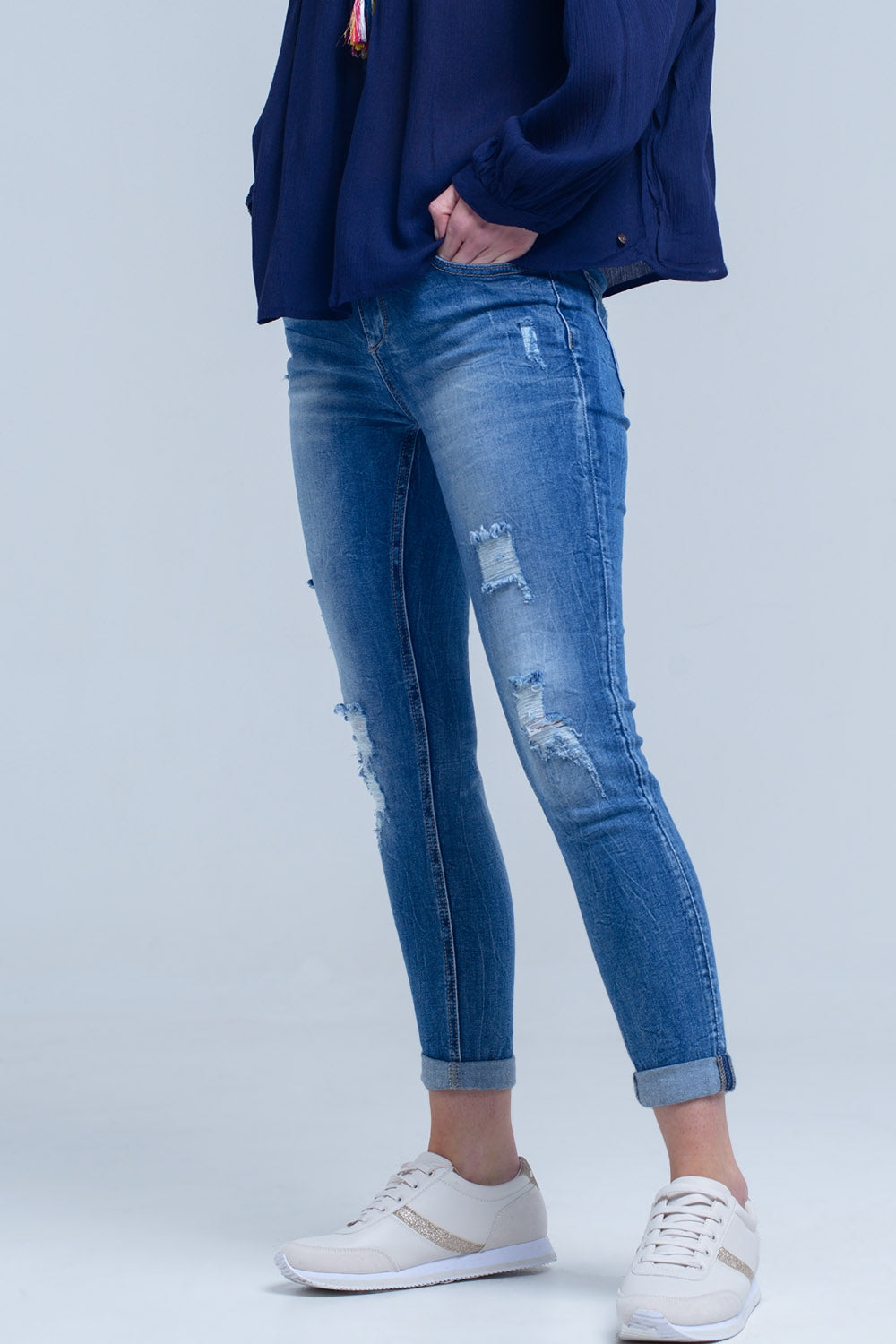 Jeans skinny strappati e strappati