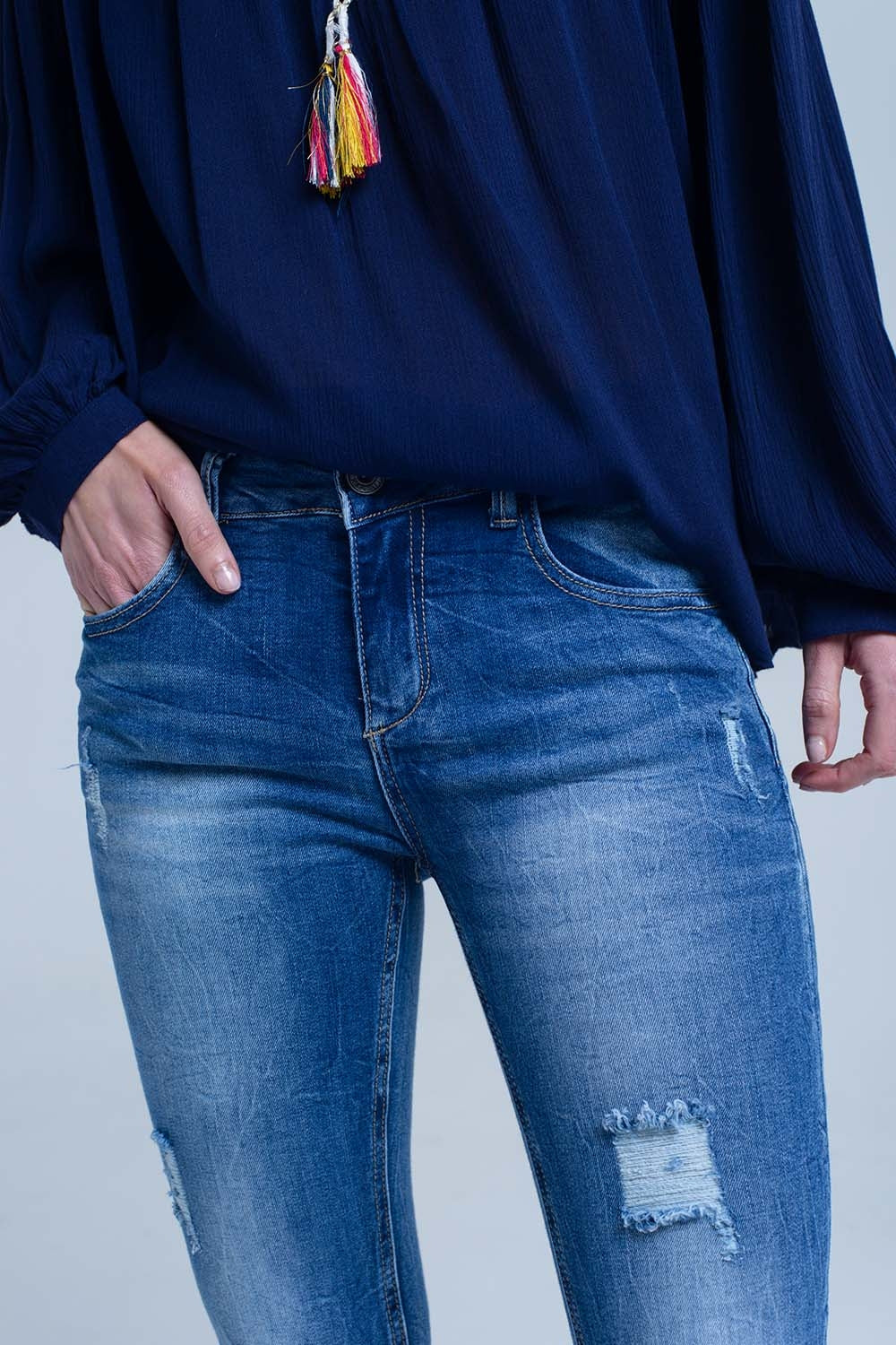 Jeans skinny strappati e strappati