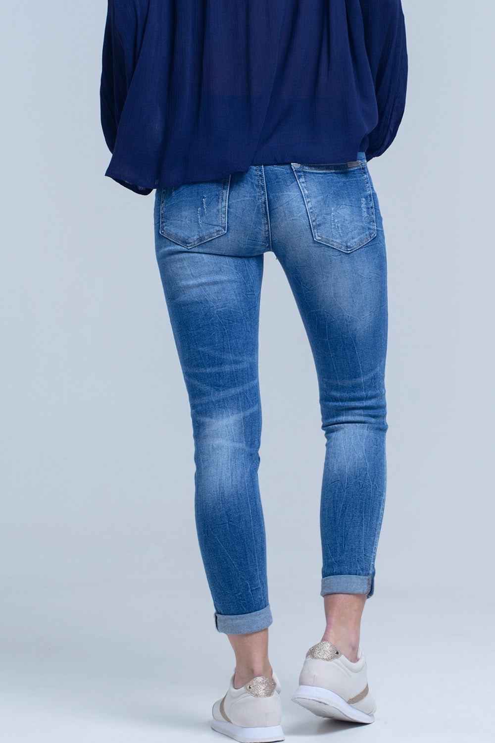 Jeans skinny strappati e strappati