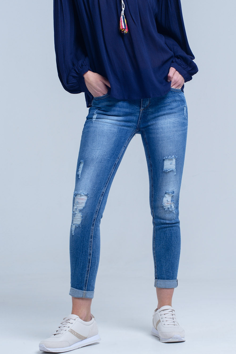 Jeans skinny strappati e strappati