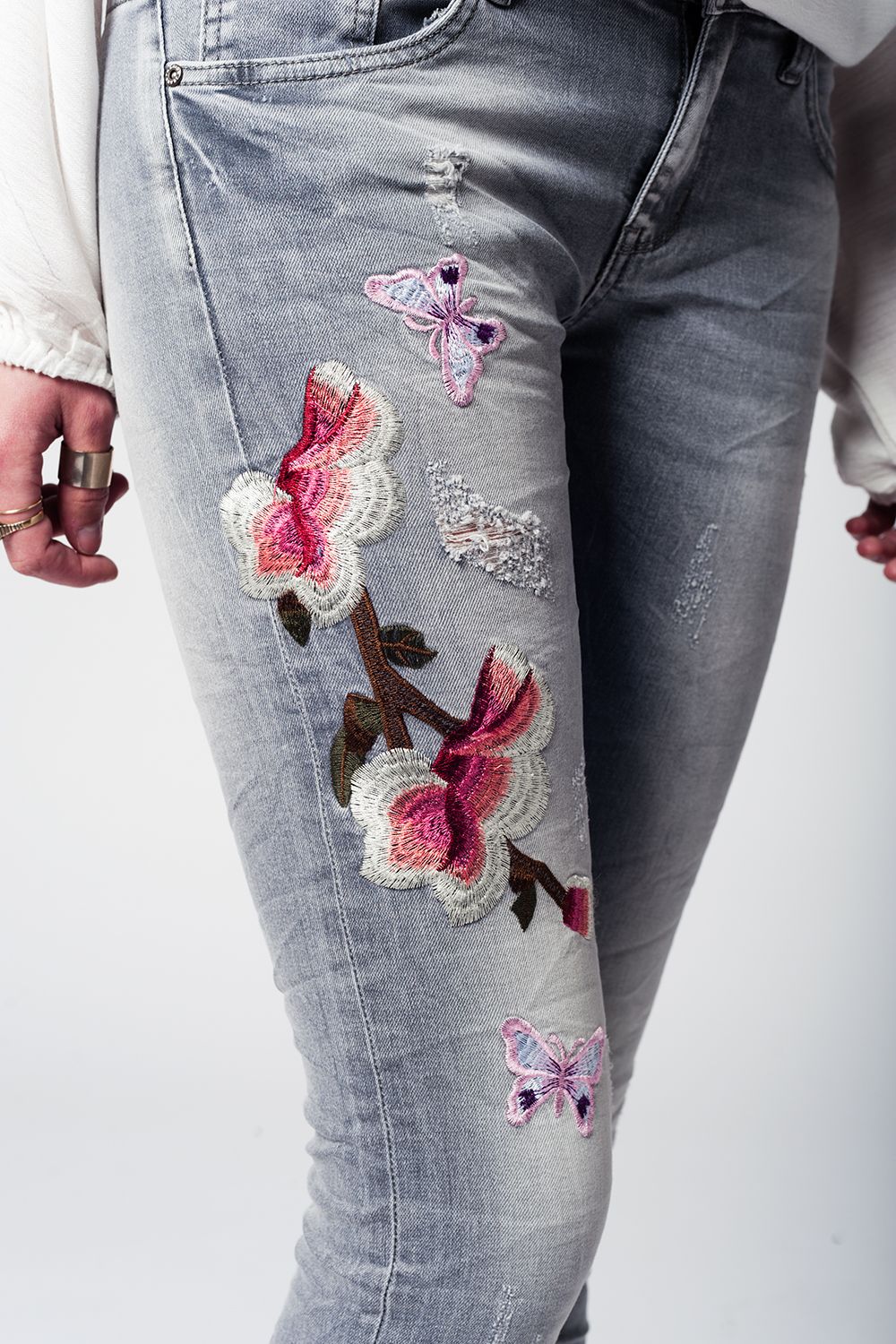 Jeans slim ricamati denim grigio