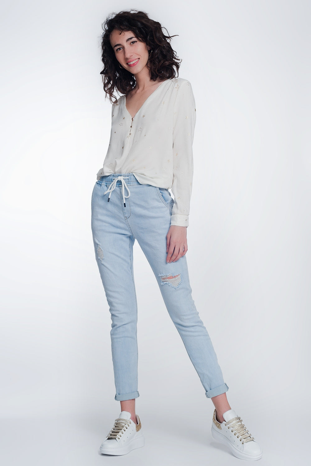 Jeans stile joggers lavaggio chiaro