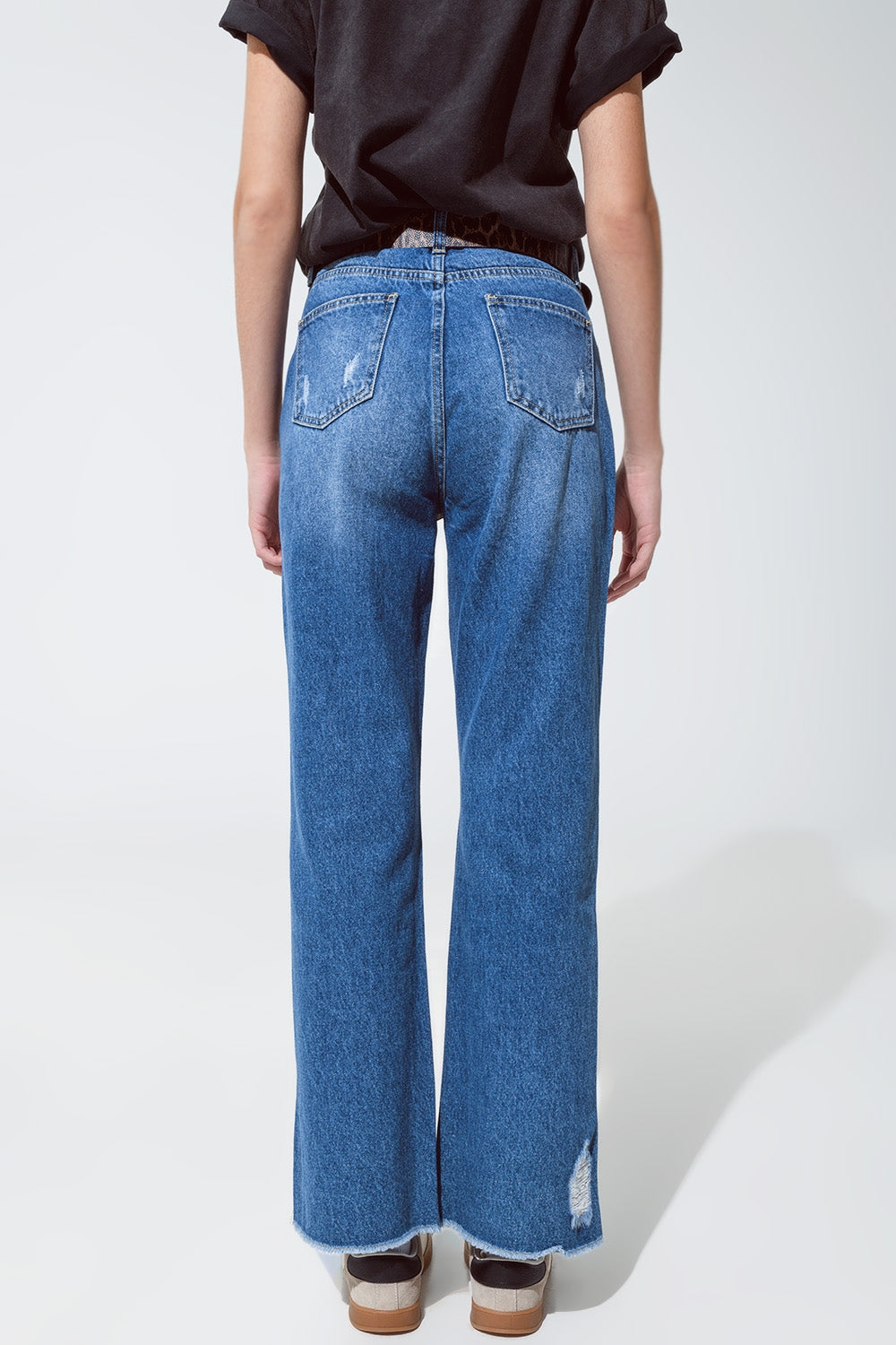Jeans strappati a gamba dritta con bagliori metallici dorati