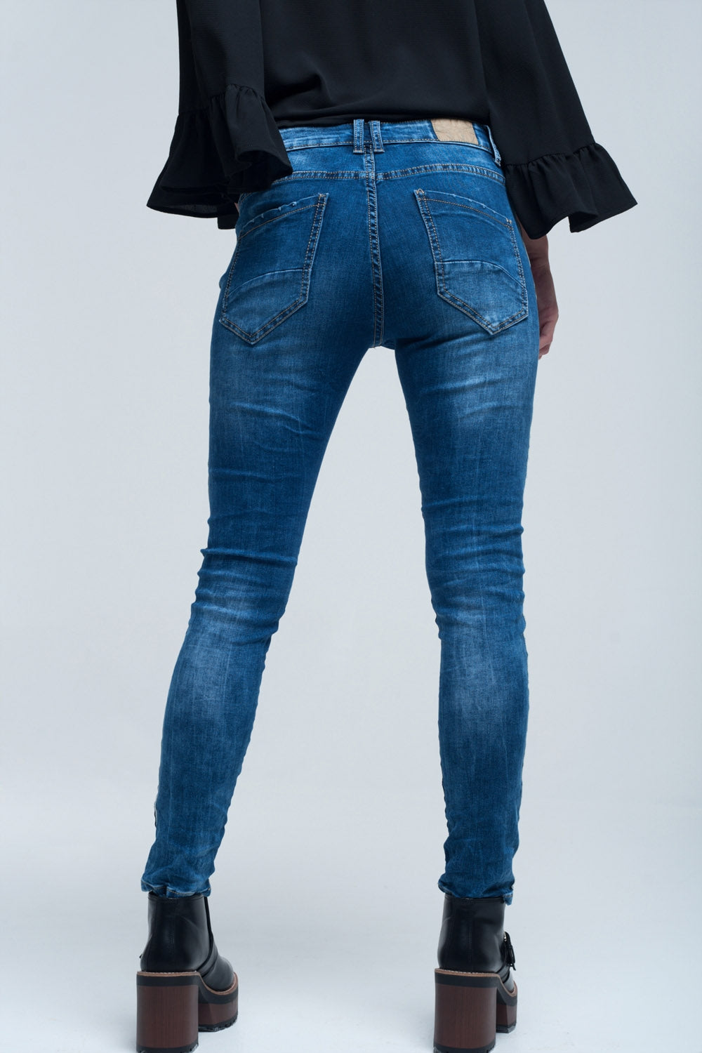Jeans stretto con strisce sul lato