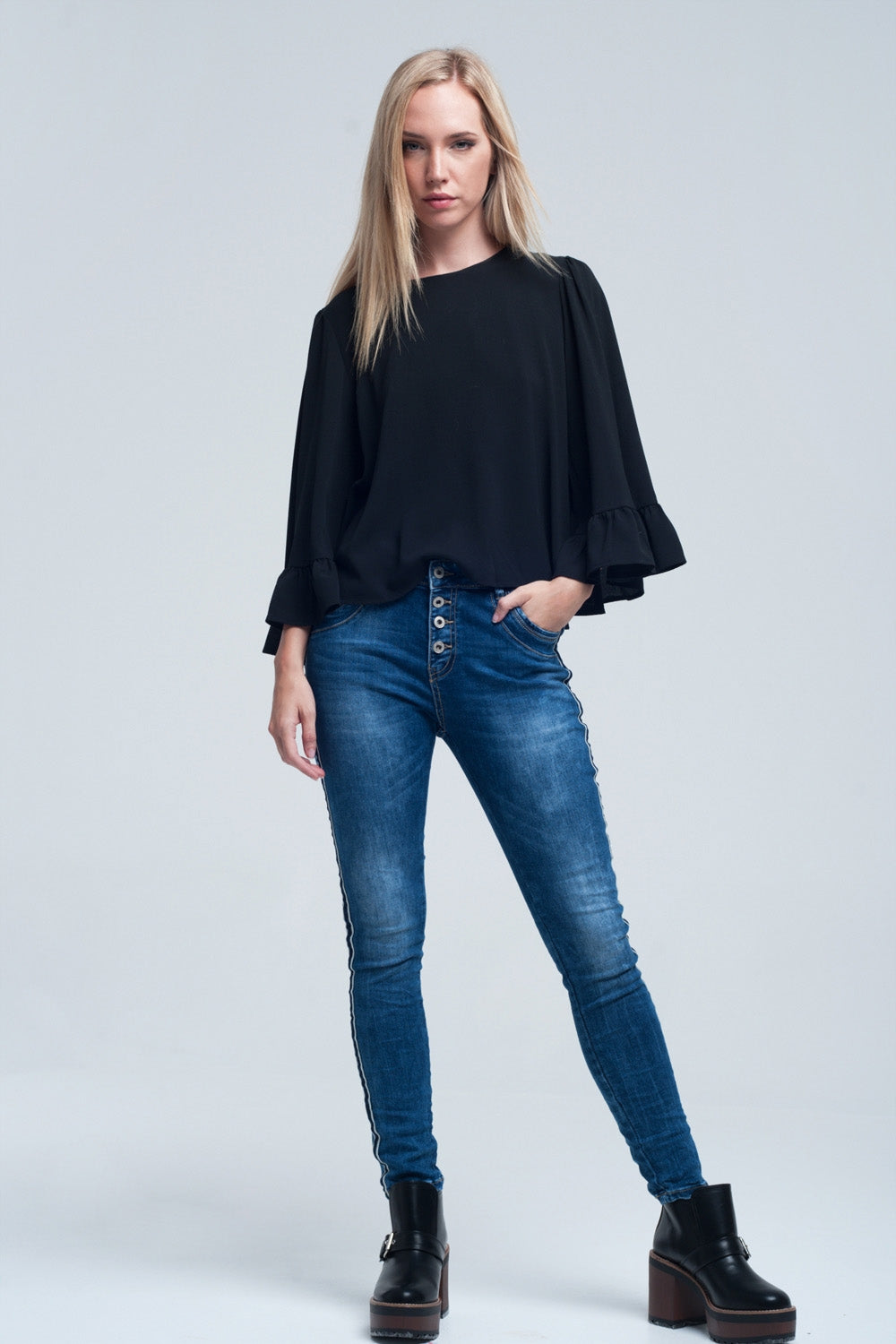 Jeans stretto con strisce sul lato