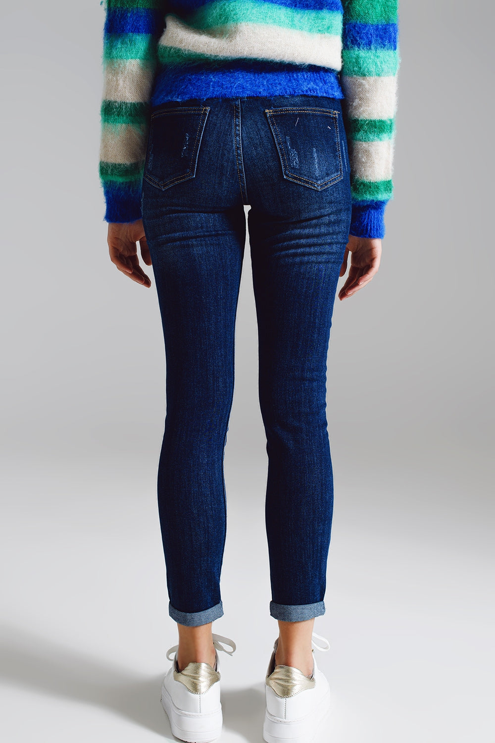 Jeans super skinny con bottoni anteriori visibili in lavaggio medio