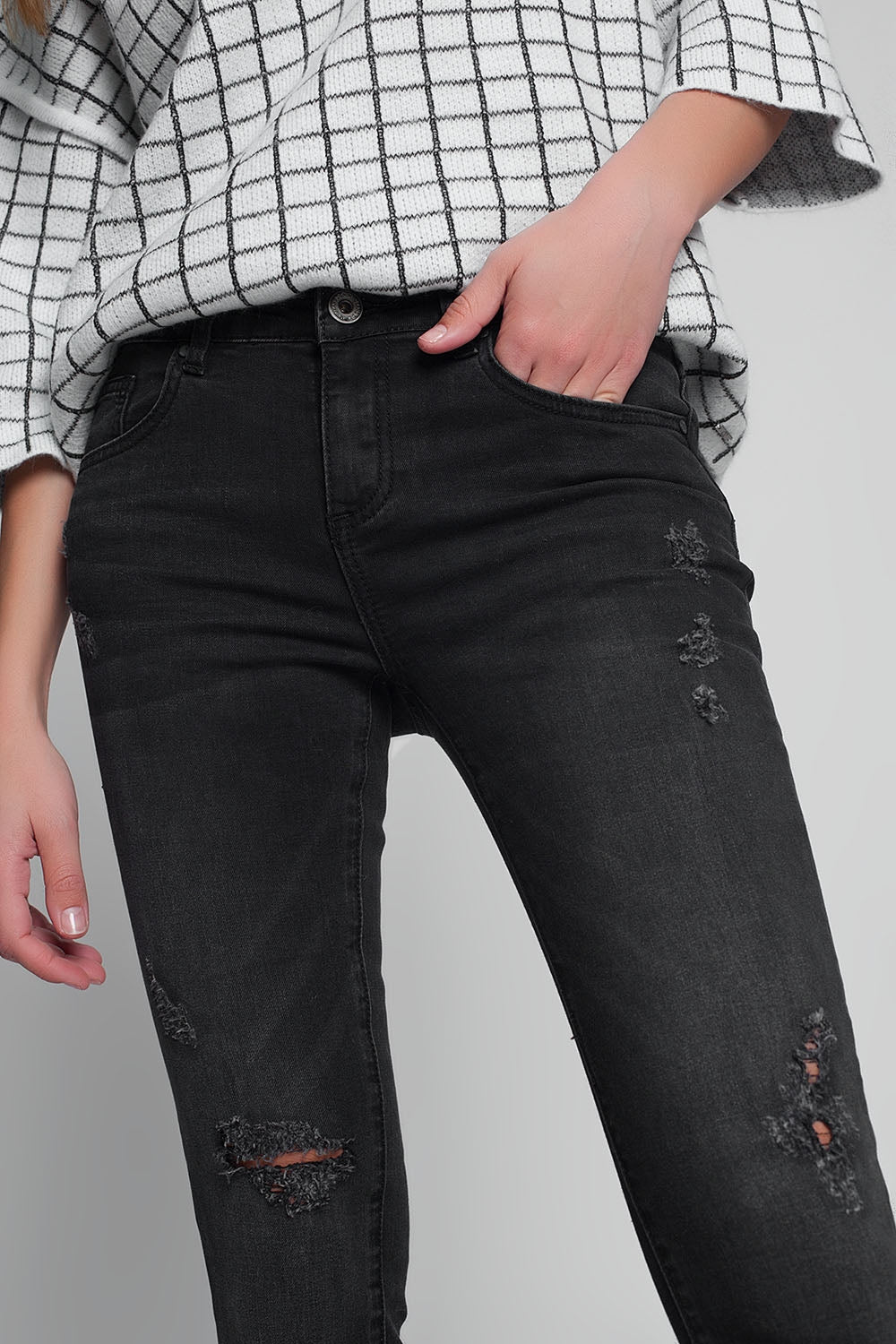 Jeans super skinny strappati lavaggio nero