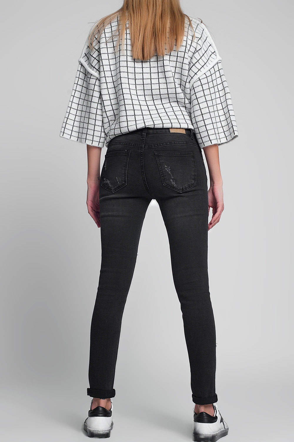 Jeans super skinny strappati lavaggio nero
