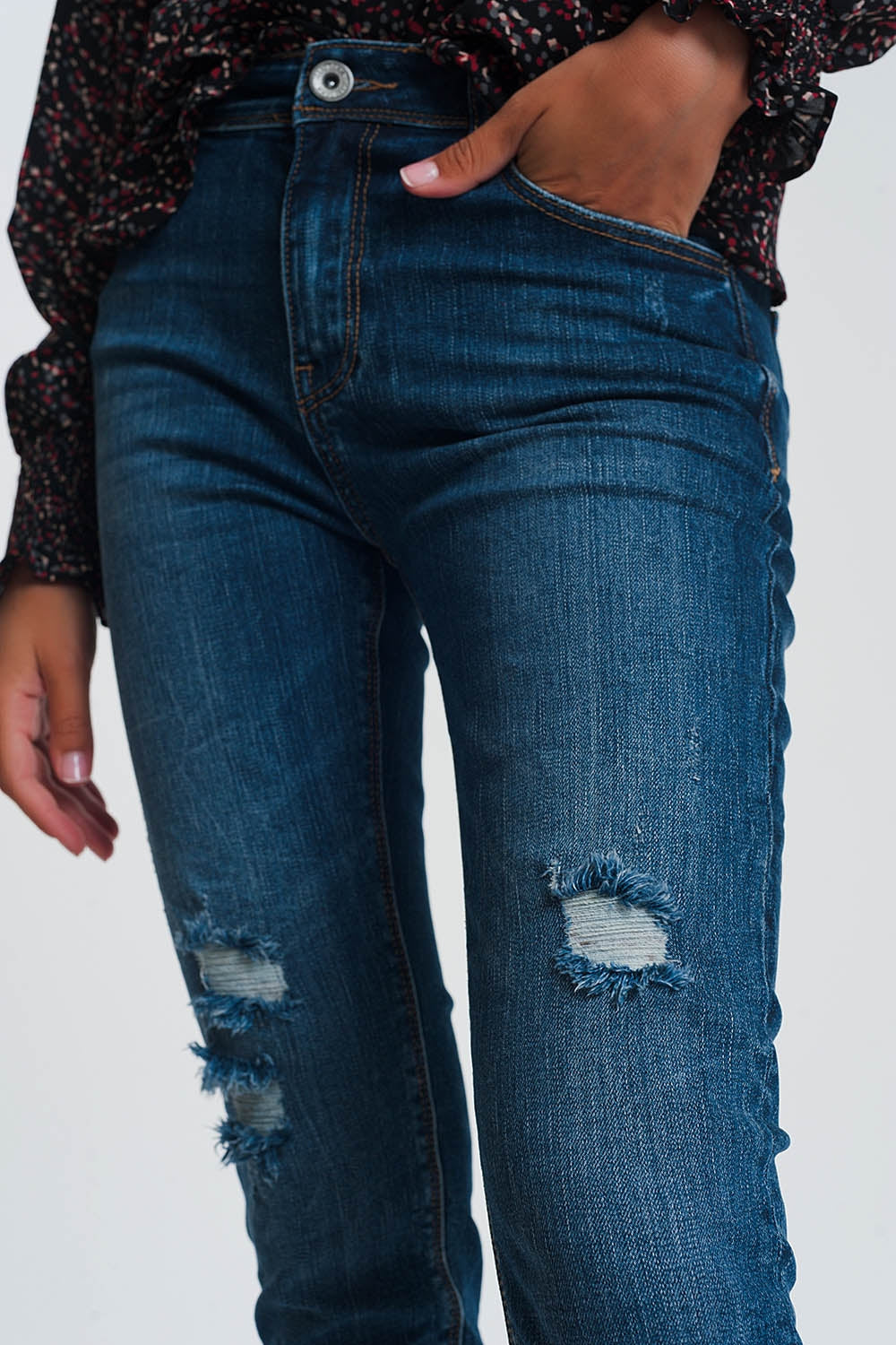 Jeans vita alta skinny blu lavaggio scuro con strappi dettagli