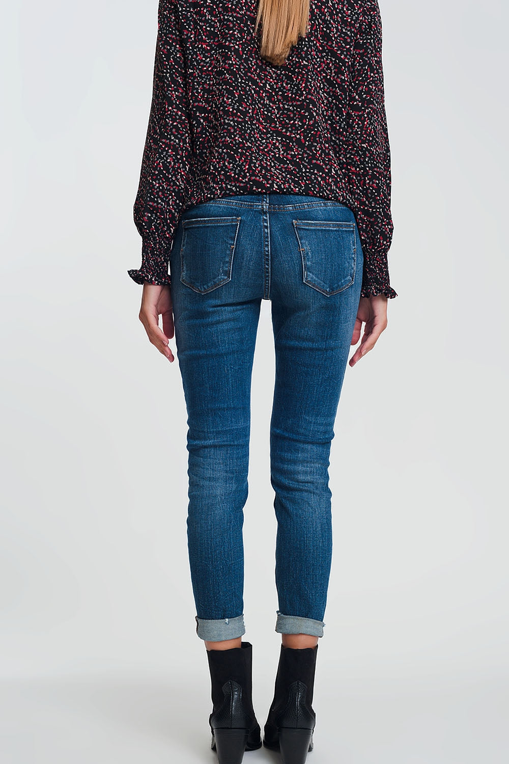 Jeans vita alta skinny blu lavaggio scuro con strappi dettagli