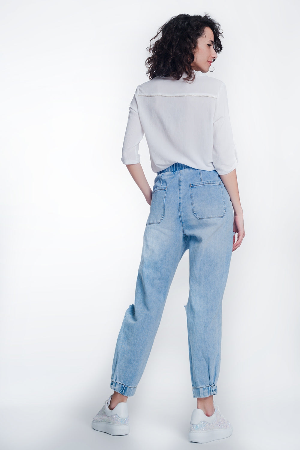 Joggers di jeans strappati blu lavaggio chiaro
